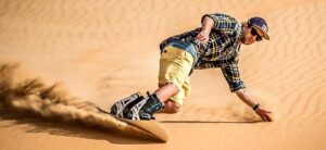 Sandboarding in Merzouga sand dunes